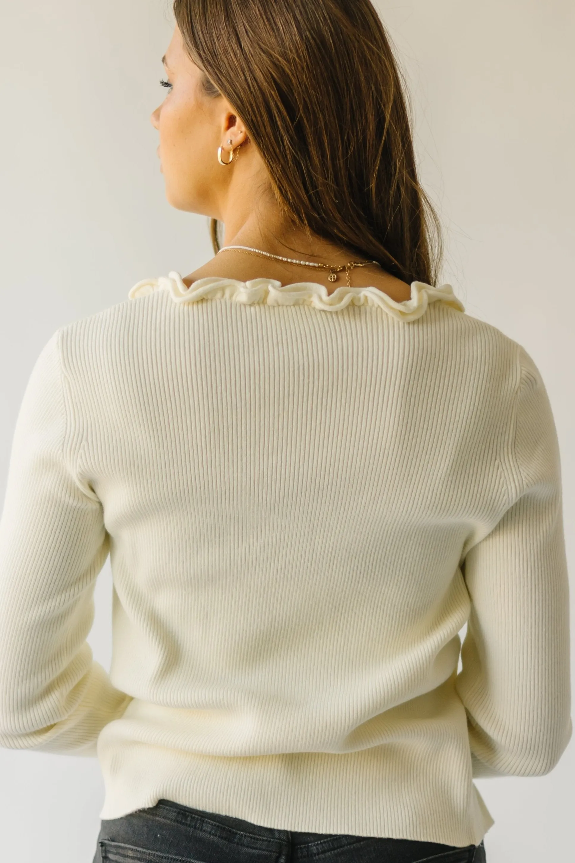 The Sagola Frill Hem Cardigan in Cream